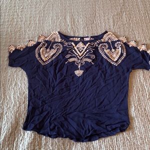 Blue flowy top with shoulder cutouts!